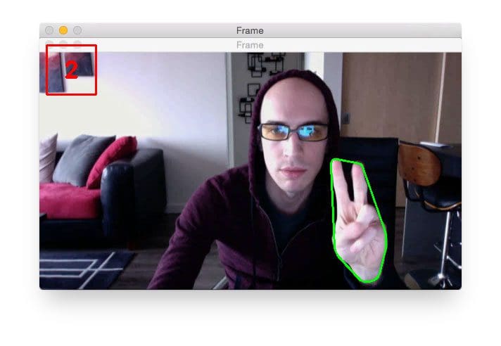 Figure 3: Finding extreme points along a contour with OpenCV plays a pivotal role in hand gesture recognition.
