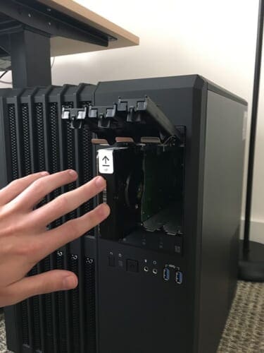 Figure 6: Slotting the drives into their respective bays is easy. After slotting, the drives are securely locked in place.