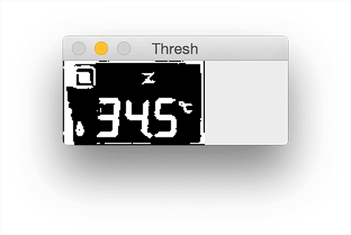 Figure 8: Thresholding LCD allows us to segment the dark regions (digits/symbols) from the lighter background (the LCD display itself).