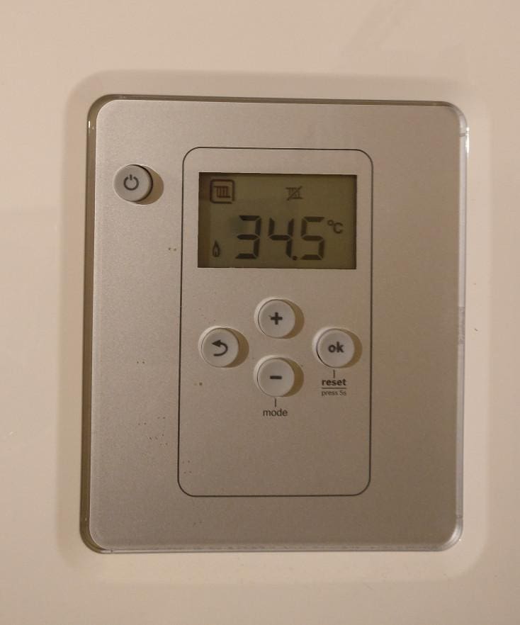 Figure 5: Our example input image. Our goal is to recognize the digits on the thermostat using OpenCV and Python.